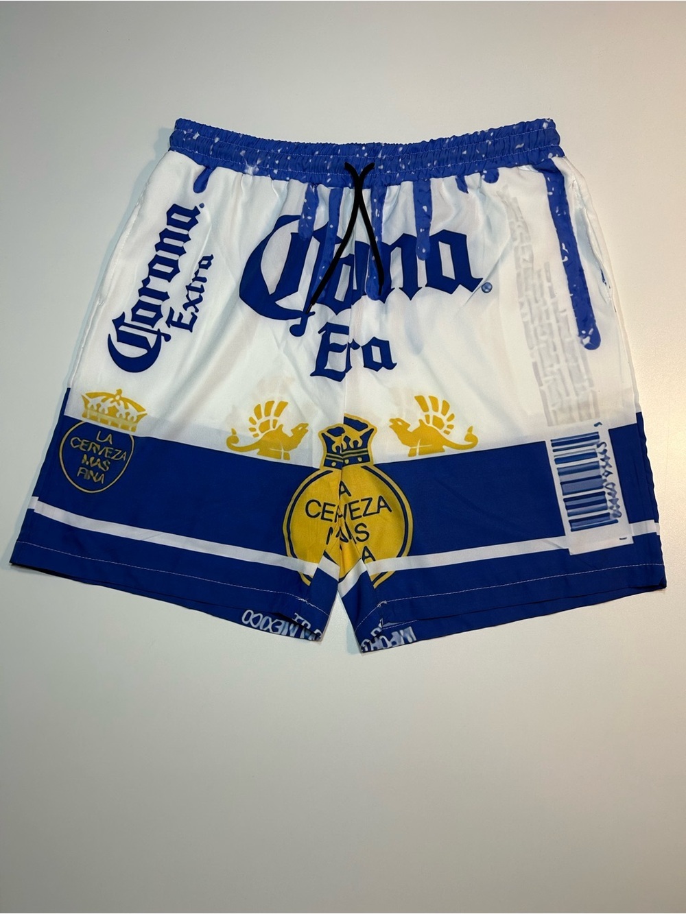 Corona Extra Scattered Labels Board Shorts Blue White Graphic Beer Swim Trunks